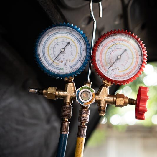 Close-up of two pressure gauges